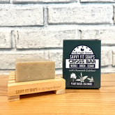 A box of Savvy Fit Soaps Cross Bar in Neroli, Birch, and Cedar, with an open soap, highlighting its plant-based, USA-made natural skincare formula.